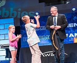 Carlos David performing magic at Awana Awards 2023